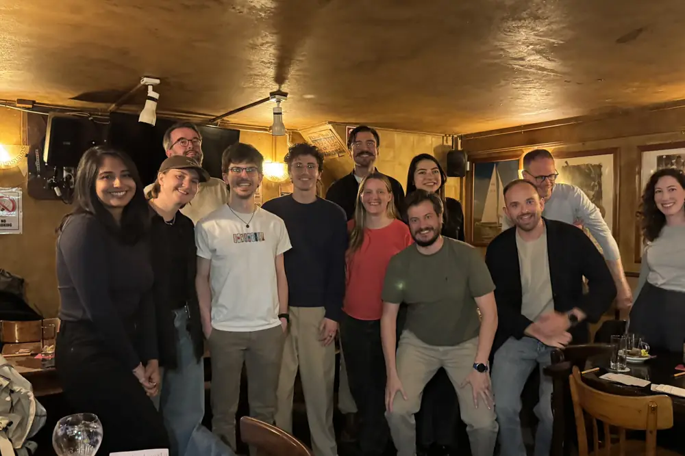 The room at the May Salon, gathered together in the back room at Mulligans.
